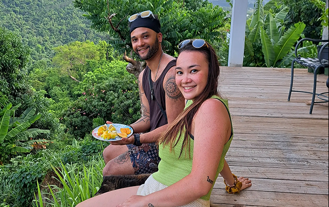 Couple eating at Rainforest River Ride Adventure in El Yunque National Rainforest, Rio Grande, Puerto Rico