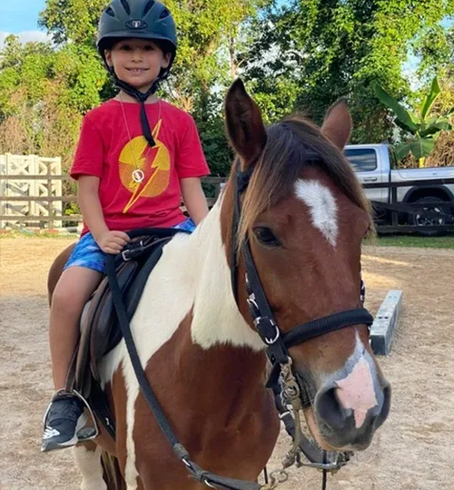 small-child-posing-on-horseback
