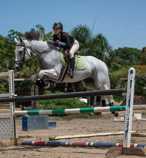 young-female-competing-on-horseback